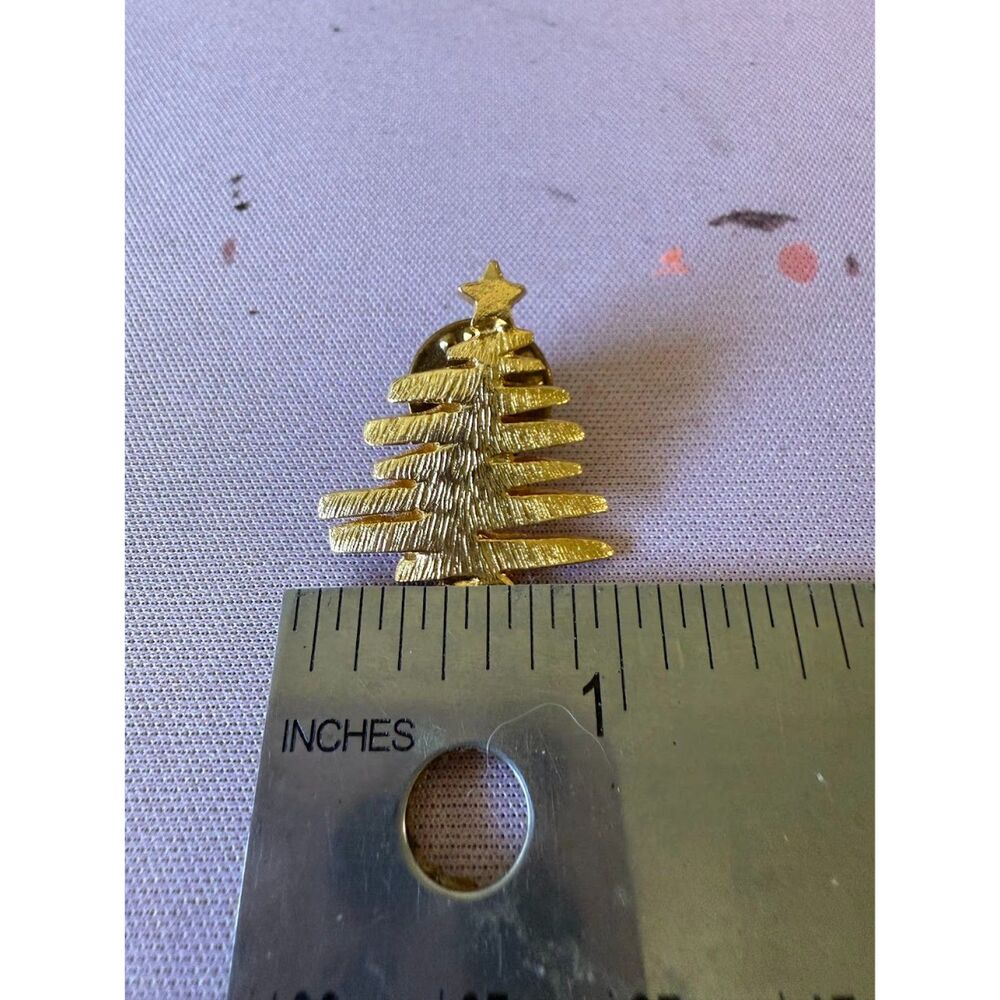 Gold-toned Christmas tree pin
